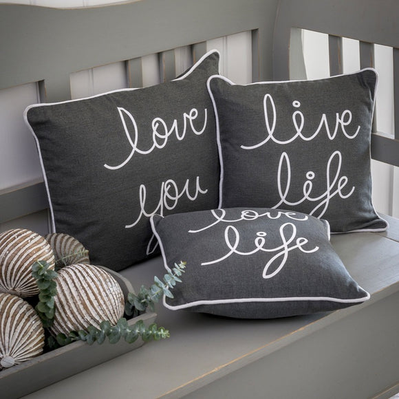 Selection of grey and white slogan cushions Live Love Life