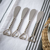 Set of Four Twisted Nickel Heart Butter Knives